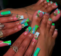 This Set of 48 Hand And Foot Nails Showcases a Beautiful Green And Blue Marble Pattern, Enhanced with Floral Decorations And Gem Details. Comfortable, Durable, And Easy to Apply. Comes with Jelly Glue