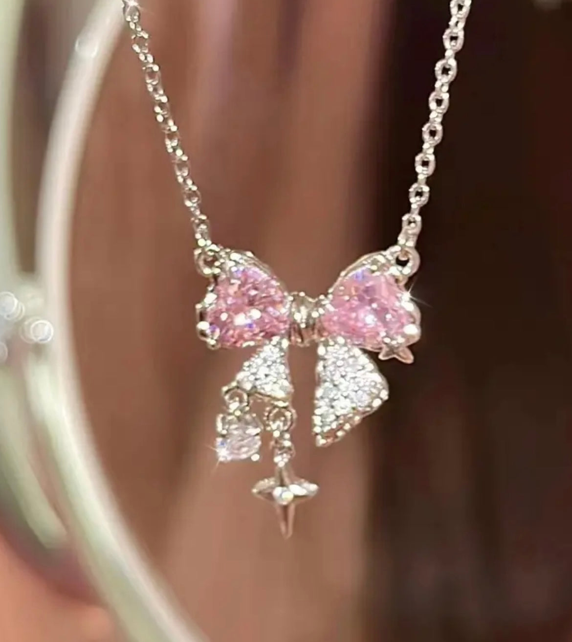 A Pink Zirconia Bow Necklace with a Unique And Elegant, a Simple And Light Luxury Necklace, And an Ins Student Retro Necklace