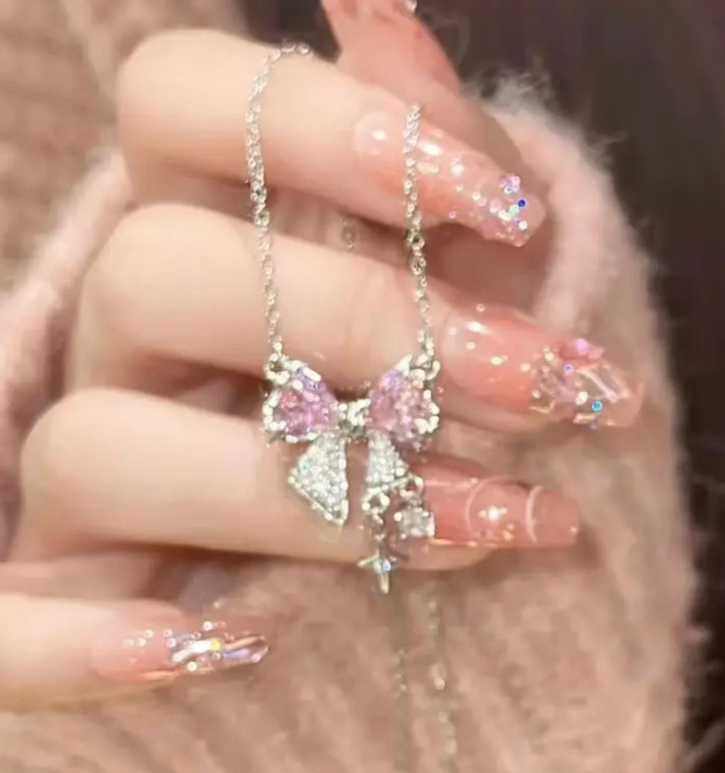A Pink Zirconia Bow Necklace with a Unique And Elegant, a Simple And Light Luxury Necklace, And an Ins Student Retro Necklace