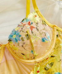 Women's Sexy Floral bodysuit - Transparent Mesh one-piece with Crossover Back Straps, Form-Fitting Low-Rise Outfit in Mustard-Yellow & Blue Floral Patterns for Parties, Dates, Everyday